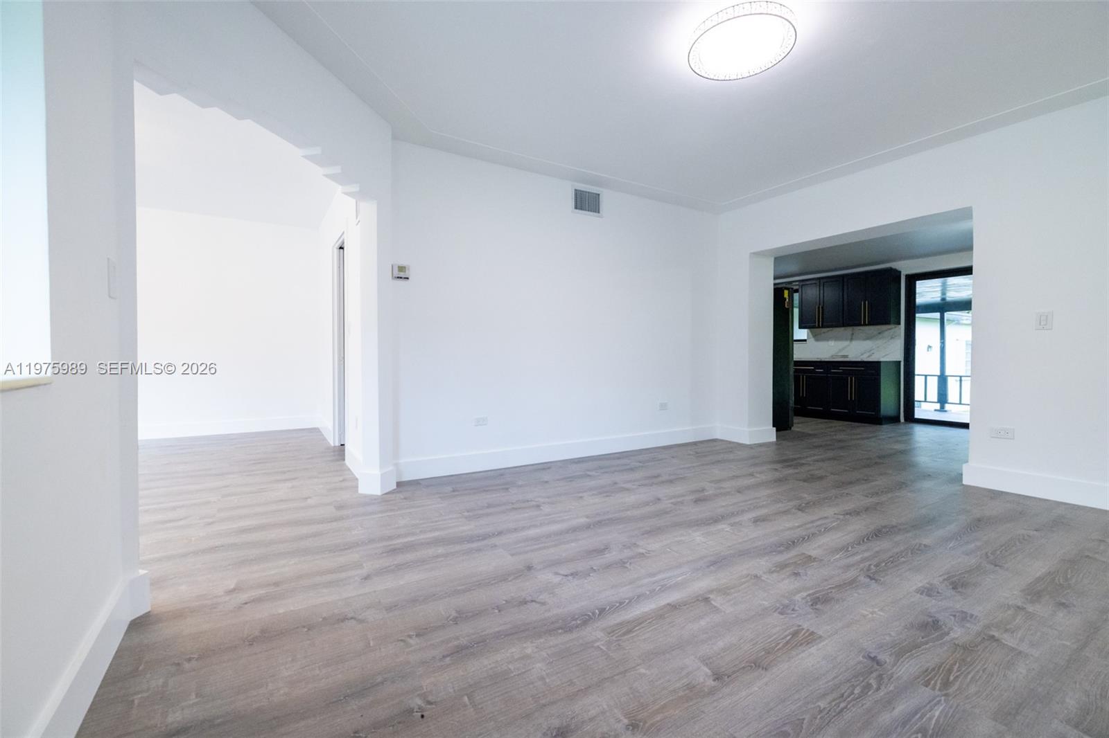 3401 Southwest 17th Street, Unit 3401 Miami, FL 33145 - Photo 62 of 69 a view of empty room with wooden floor