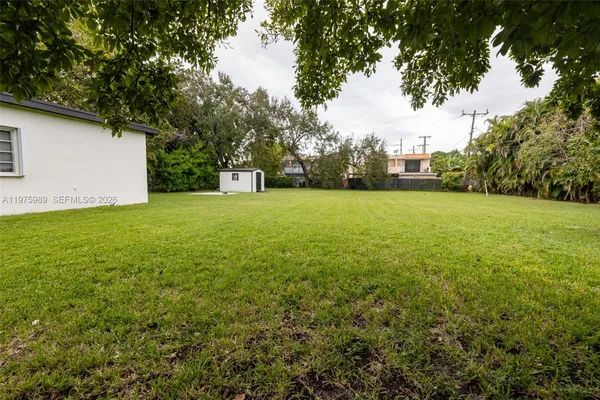 a view of an outdoor space and a yard