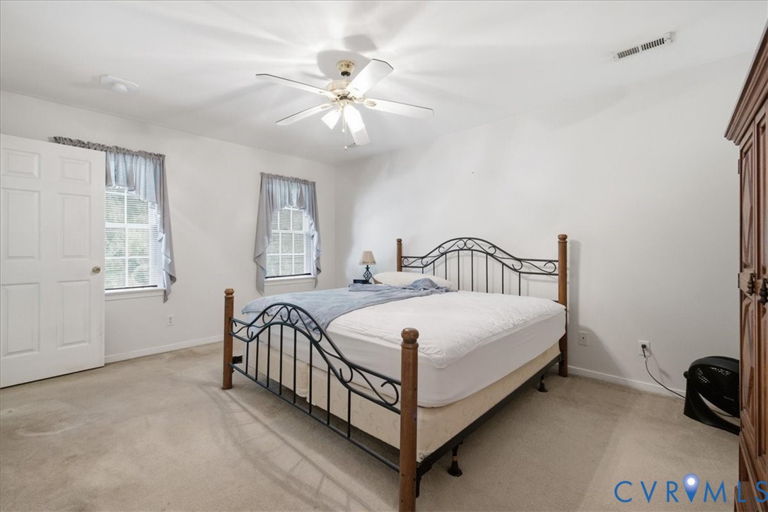 13308 South Chester Road Chester, VA 23831 - Photo 30 of 41 Spacious bedroom with ceiling fan and recessed lig