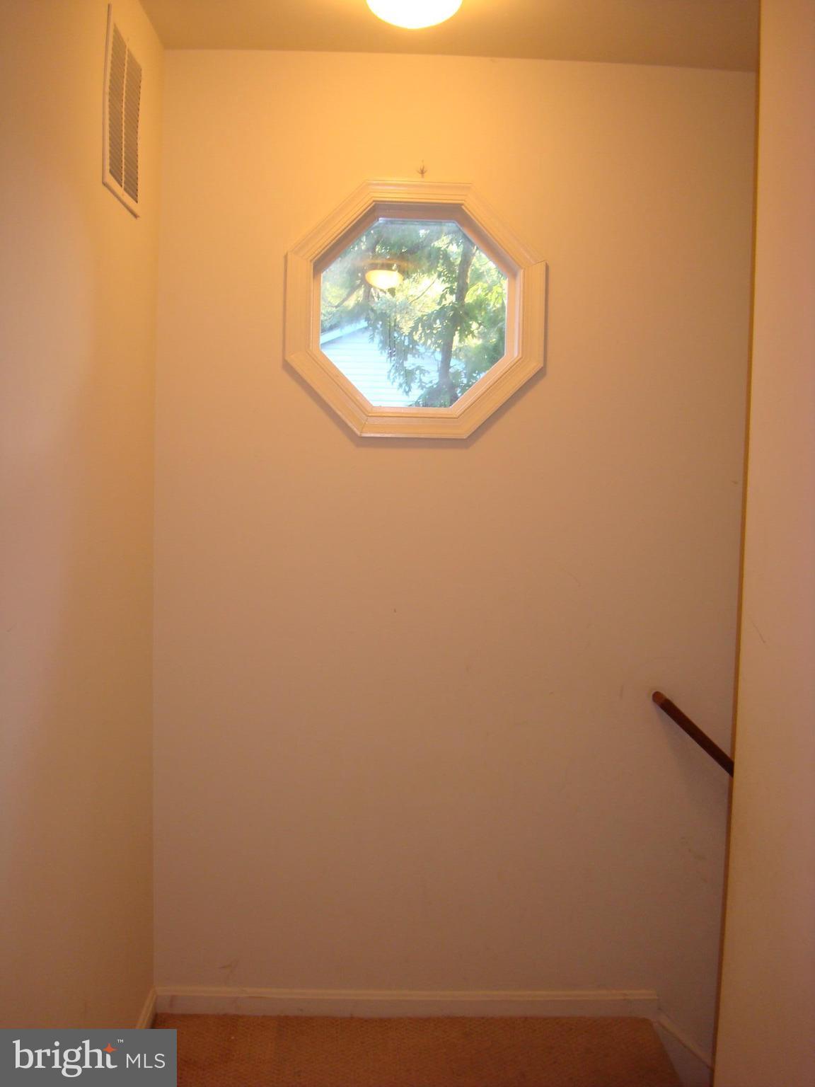 4728 Idlewilde Road Shady Side, MD 20764 - Photo 16 of 24 Port holes bring in added natural light!