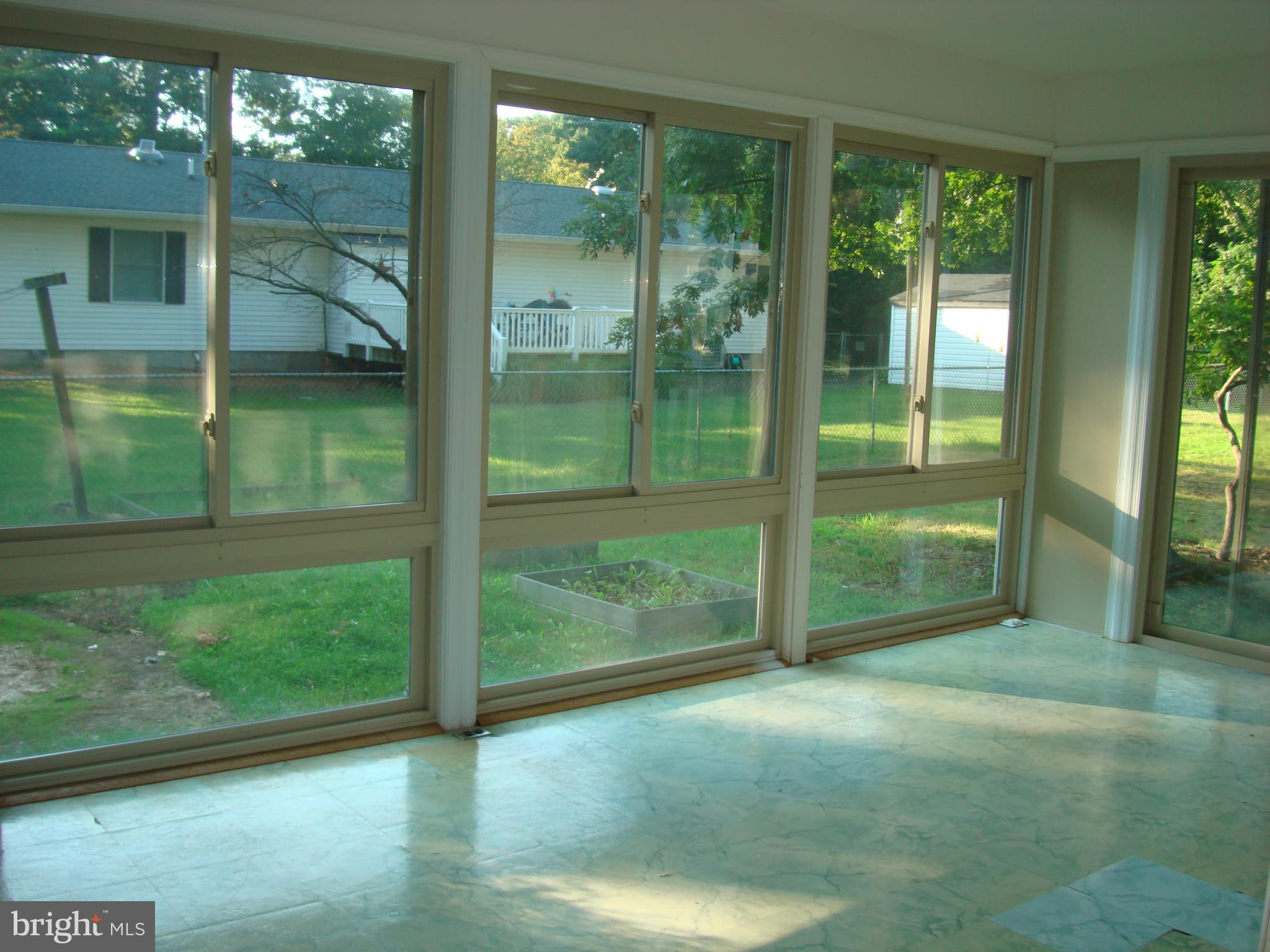 4728 Idlewilde Road Shady Side, MD 20764 - Photo 10 of 24 Main Level Sun Room measures 10x19 Heat & AC