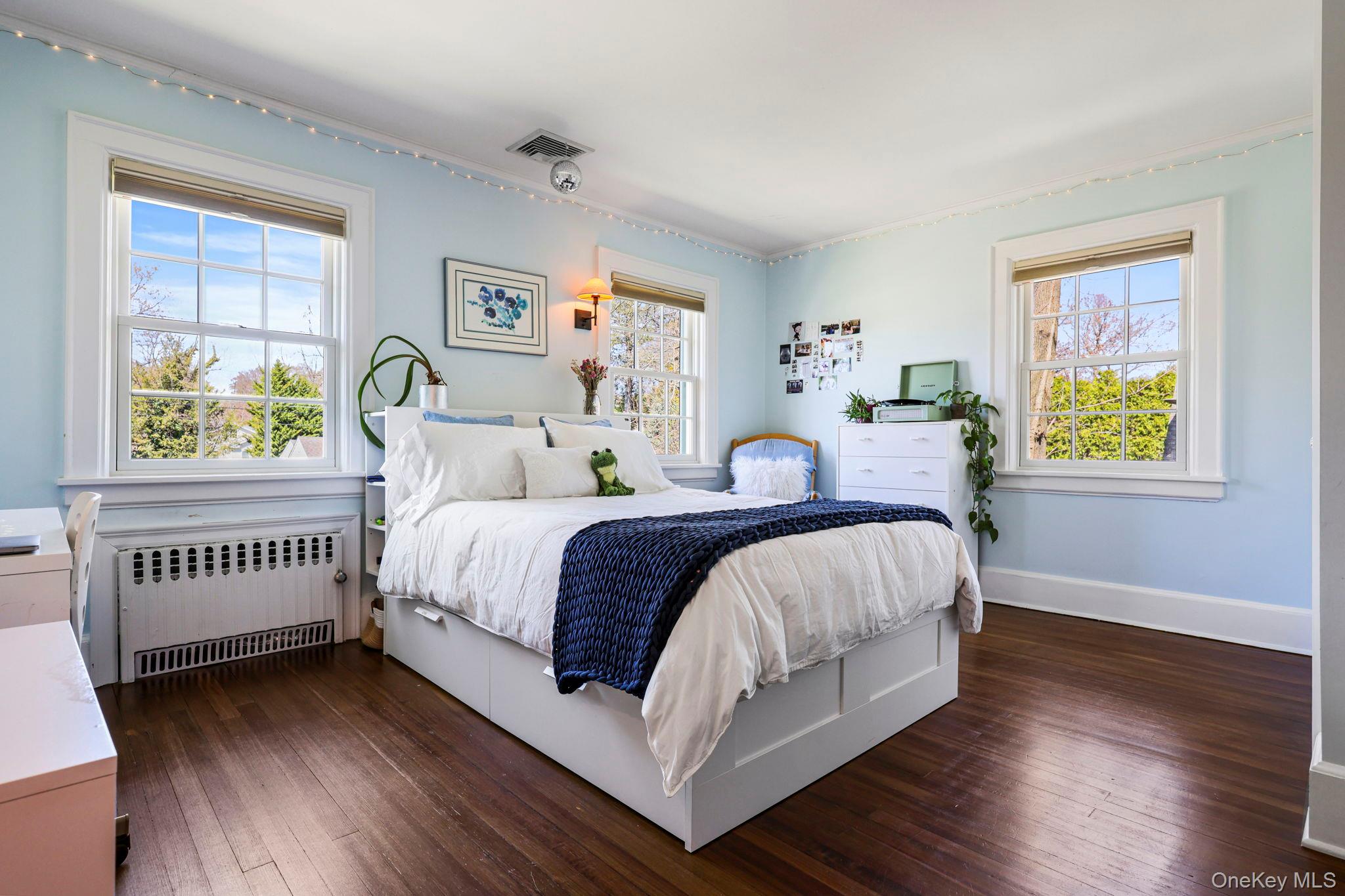 134 Brewster Road Scarsdale, NY 10583 - Photo 19 of 37 a bedroom with a bed and a window