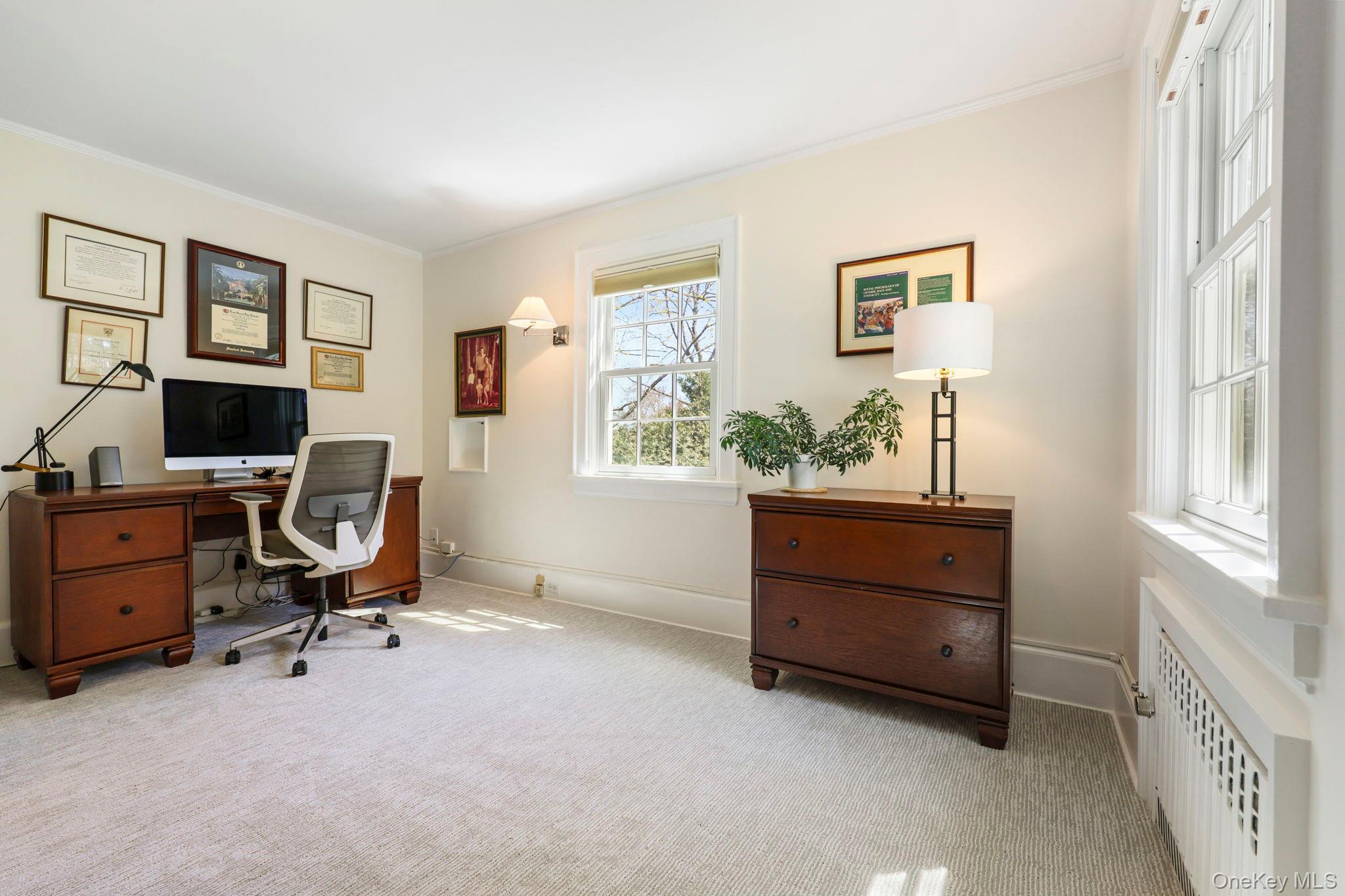 134 Brewster Road Scarsdale, NY 10583 - Photo 22 of 37 a room with furniture and window