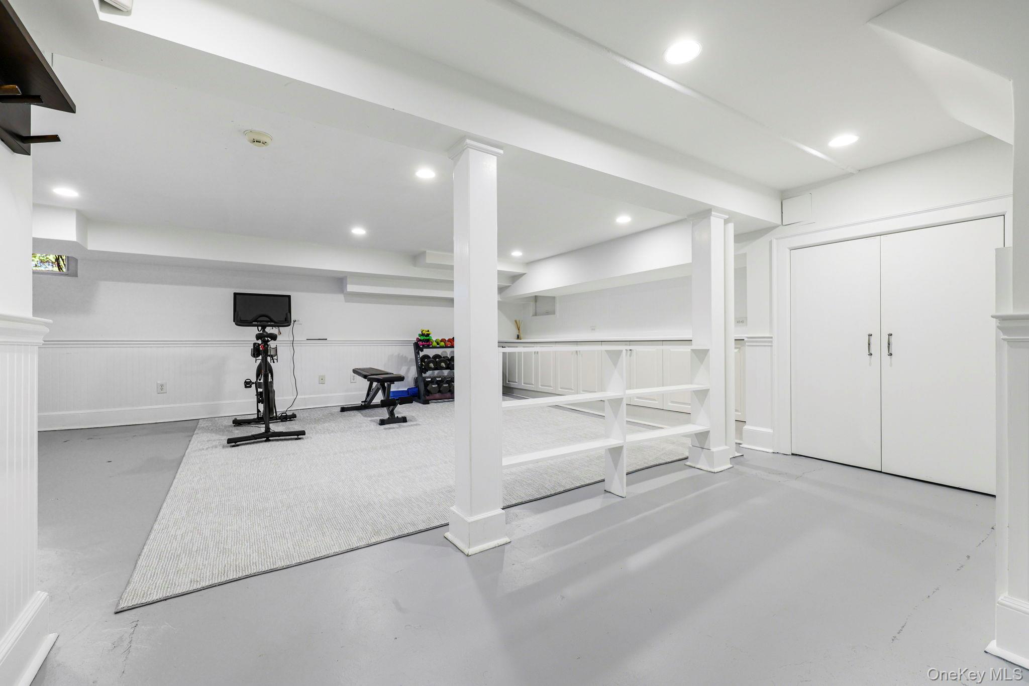 134 Brewster Road Scarsdale, NY 10583 - Photo 27 of 37 a view of a room with gym equipment