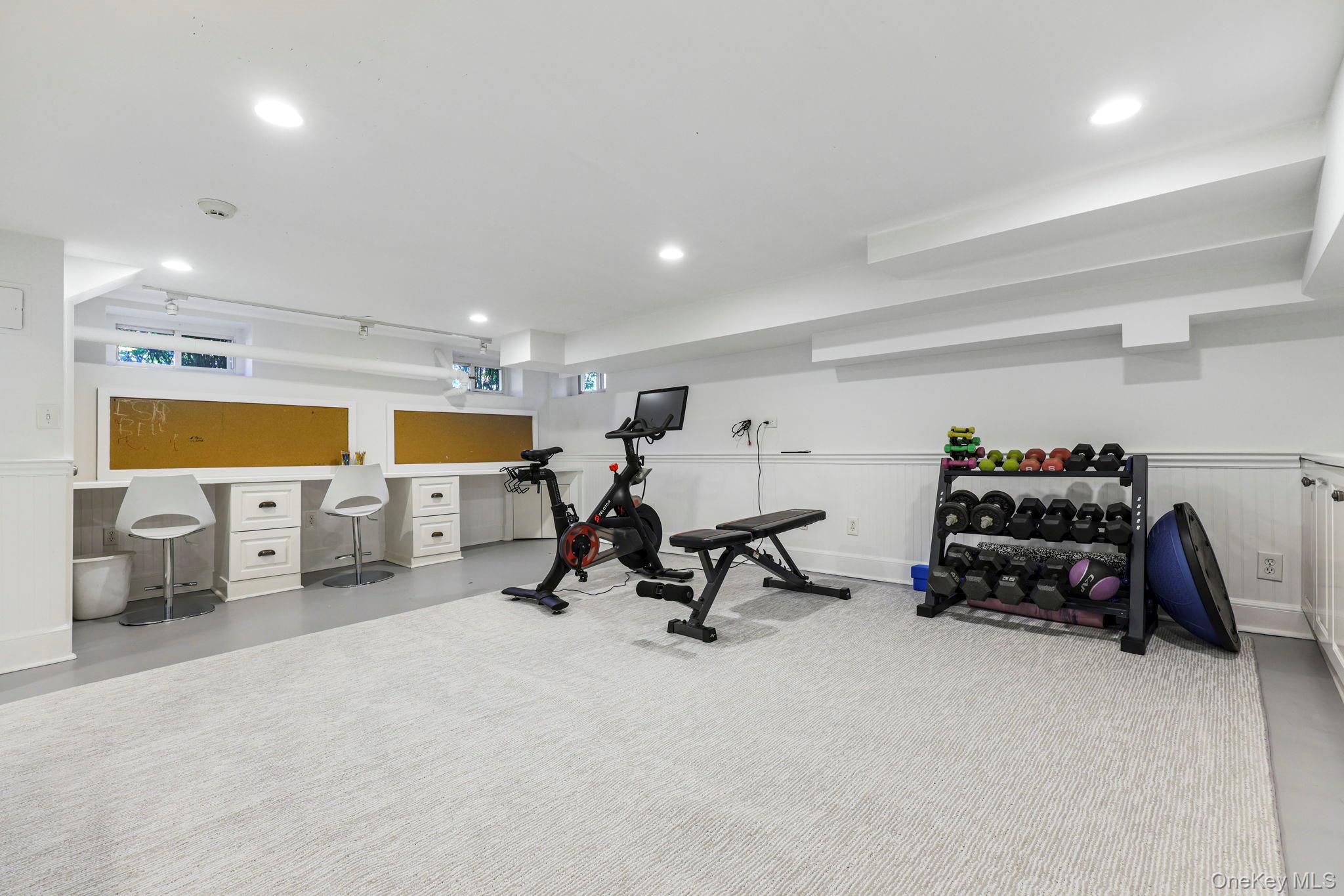 134 Brewster Road Scarsdale, NY 10583 - Photo 28 of 37 a view of a room with gym equipment