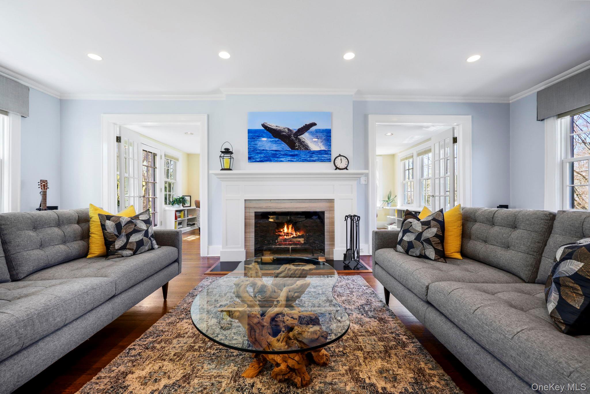 134 Brewster Road Scarsdale, NY 10583 - Photo 8 of 37 a living room with furniture and a fireplace