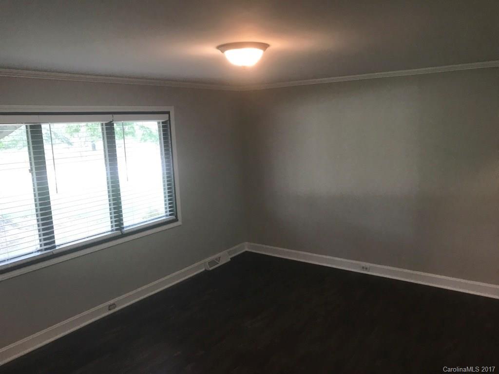 6561 Morehead Road Harrisburg, NC 28075 - Photo 15 of 24 an empty room with a window