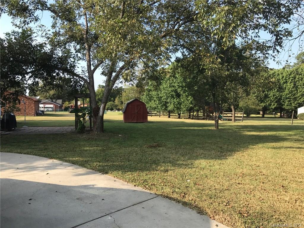 6561 Morehead Road Harrisburg, NC 28075 - Photo 24 of 24 a view of yard with green space