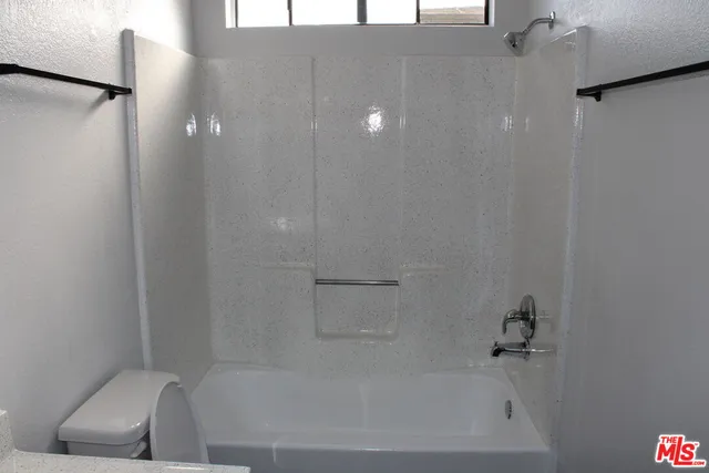 a bathroom with a bathtub