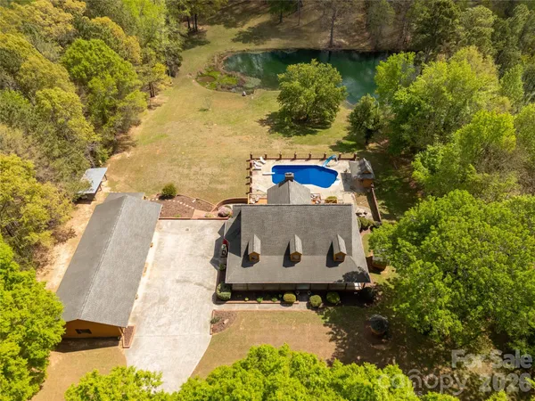 a view of a back yard with a house