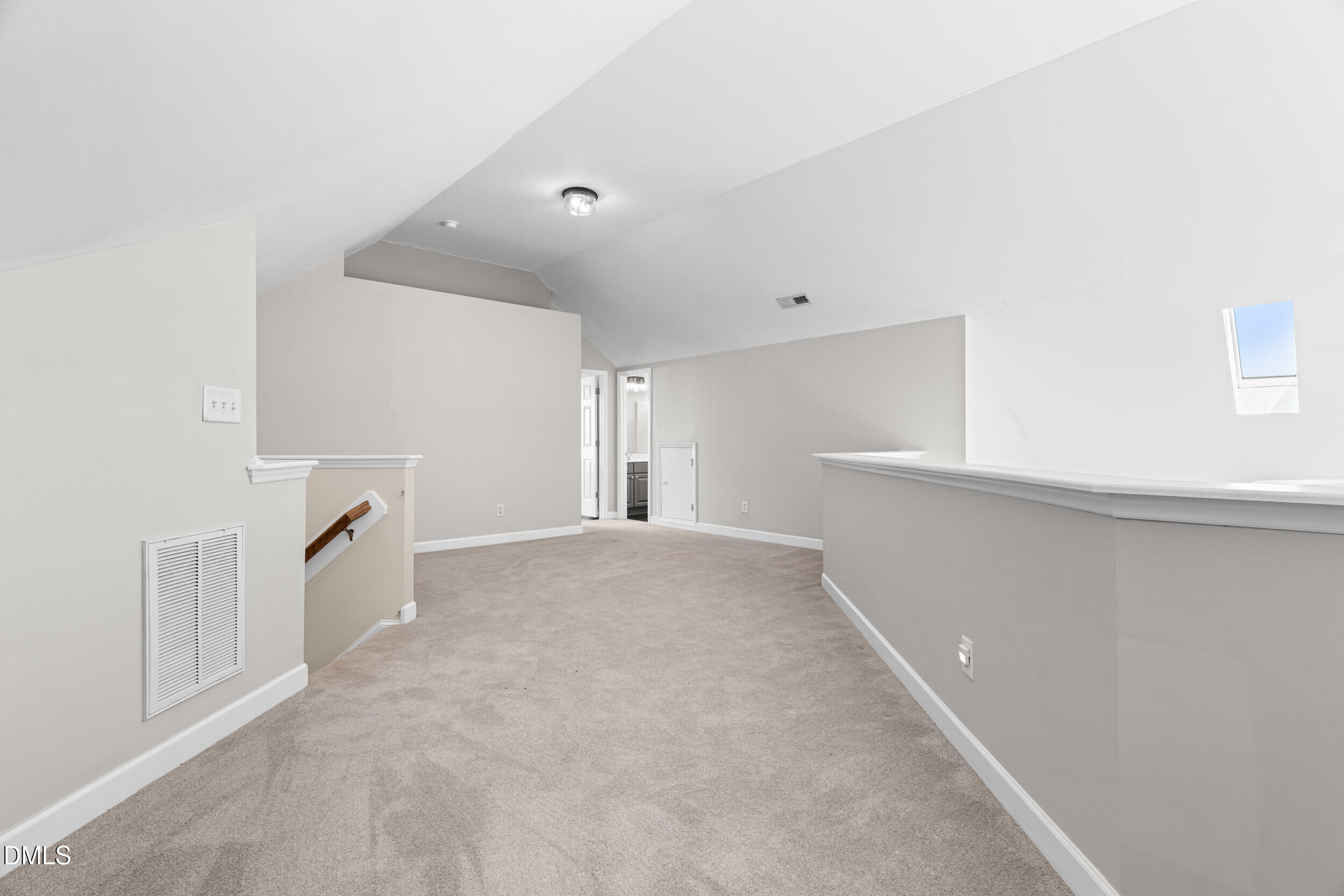 744 Seastone Street Raleigh, NC 27603 - Photo 35 of 53 a view of an empty room with a window