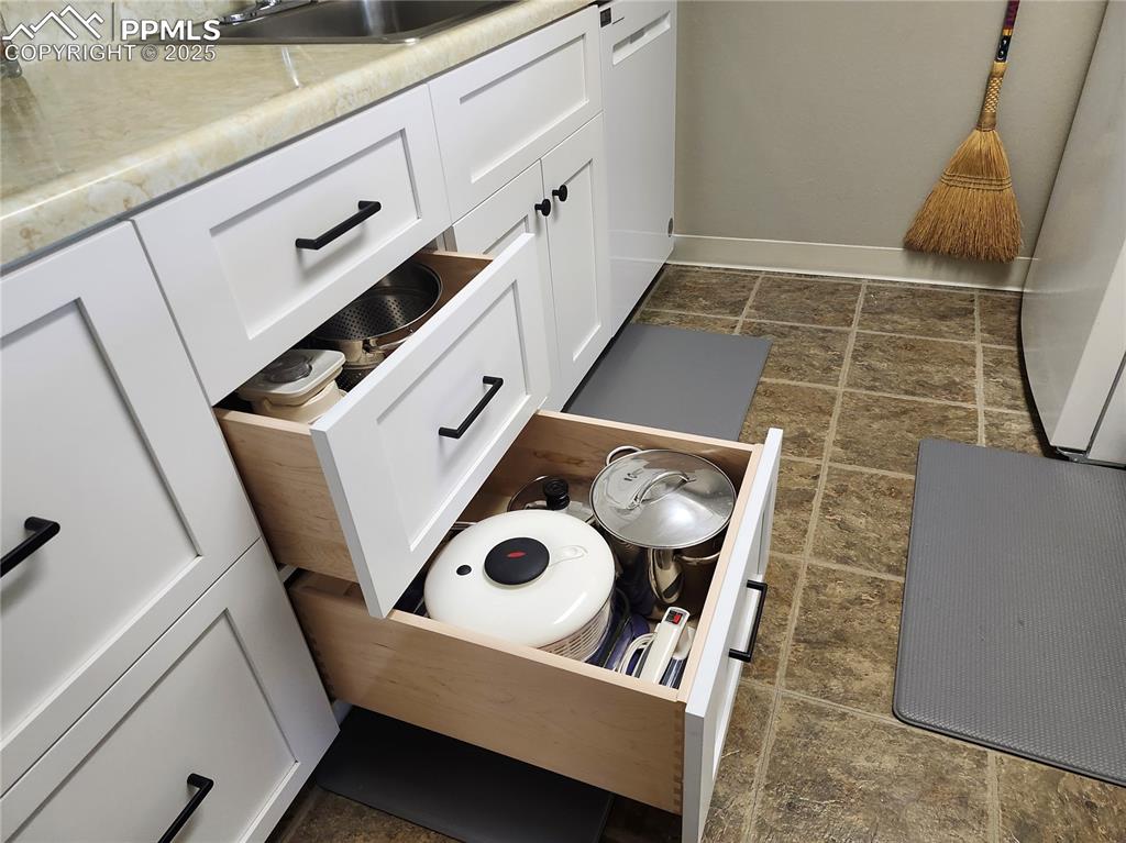 1038 Fontmore Road, Unit D Colorado Springs, CO 80904 - Photo 12 of 27 a utility room with dryer and washer