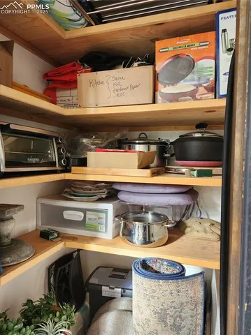 a bedroom with a bed and a closet