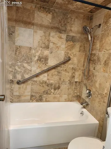 a utility room with washer and dryer