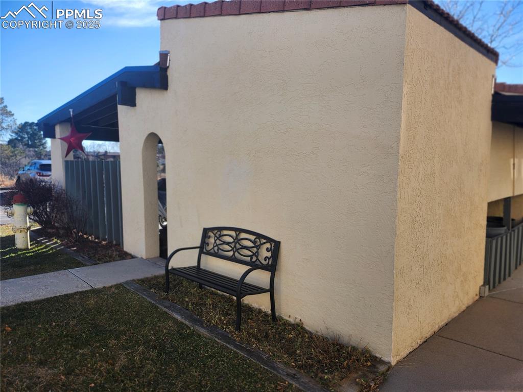 1038 Fontmore Road, Unit D Colorado Springs, CO 80904 - Photo 23 of 27 a view of wooden bench in backyard of house