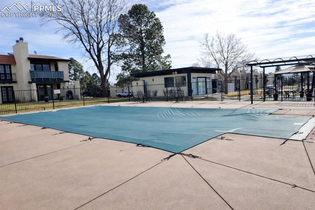 1038 Fontmore Road, Unit D Colorado Springs, CO 80904 - Photo 27 of 27 a view of a yard in front of a brick house