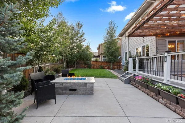 a view of backyard with seating space