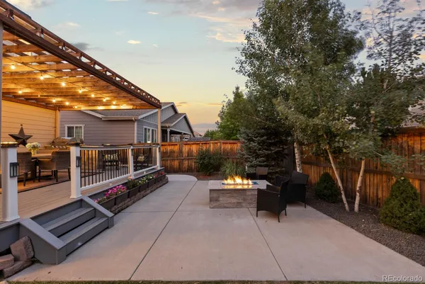 a view of a chairs and tables in the patio