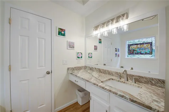 a bedroom with a workspace