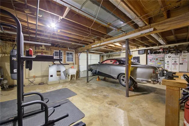 a view of backyard with plants and trees