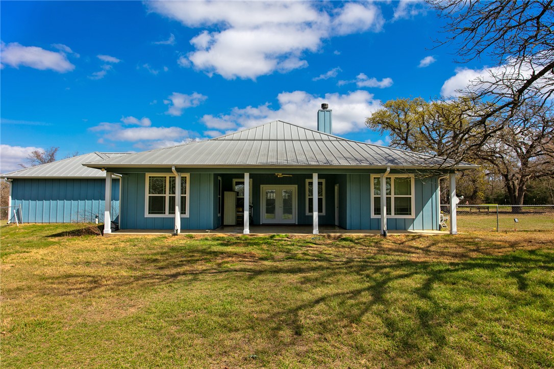4168 Owensville Cemetery Road Franklin, TX 77856 - Photo 29 of 35 a front view of a building with a garden
