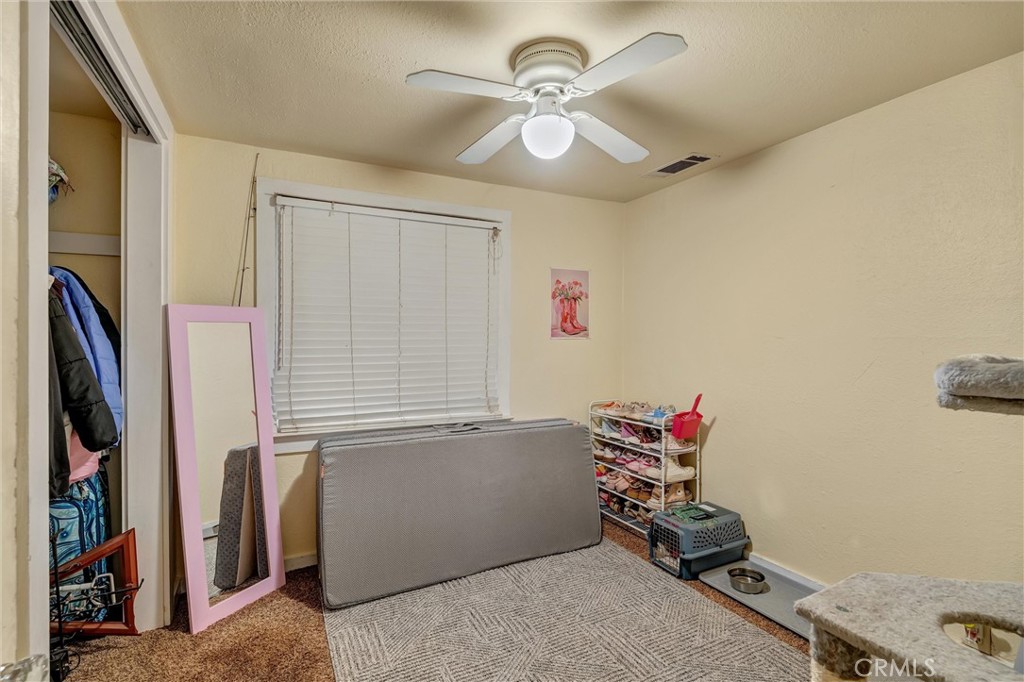 1200 Ivy Street Chico, CA 95928 - Photo 18 of 31 a room with gym equipment and a window