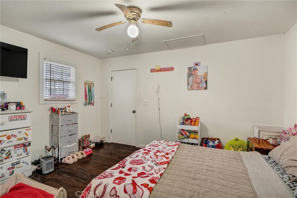 1200 Ivy Street Chico, CA 95928 - Photo 20 of 31 a bedroom with a bed and a tv