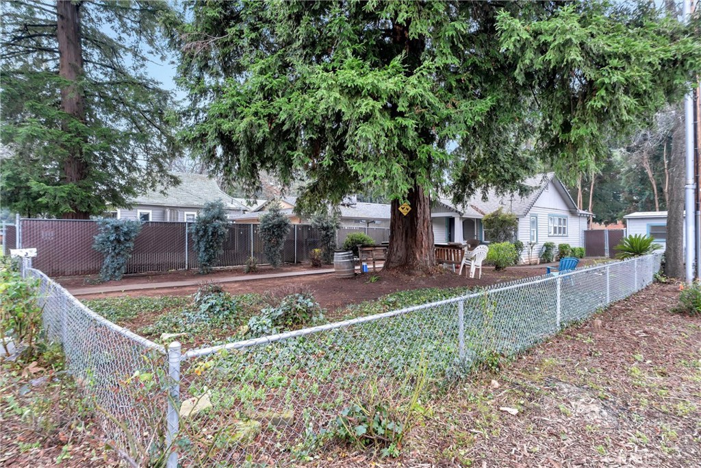 1200 Ivy Street Chico, CA 95928 - Photo 28 of 31 a view of a house with a yard
