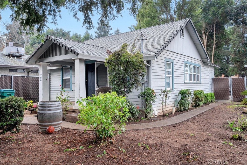 1200 Ivy Street Chico, CA 95928 - Photo 31 of 31 a view of a house with a yard and plants