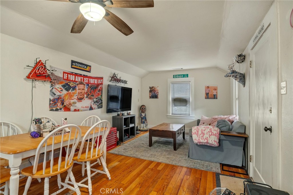 1200 Ivy Street Chico, CA 95928 - Photo 5 of 31 a living room with furniture and a flat screen tv