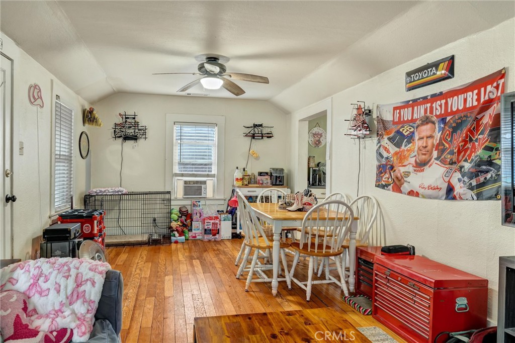 1200 Ivy Street Chico, CA 95928 - Photo 8 of 31 a living room with furniture and wooden floor