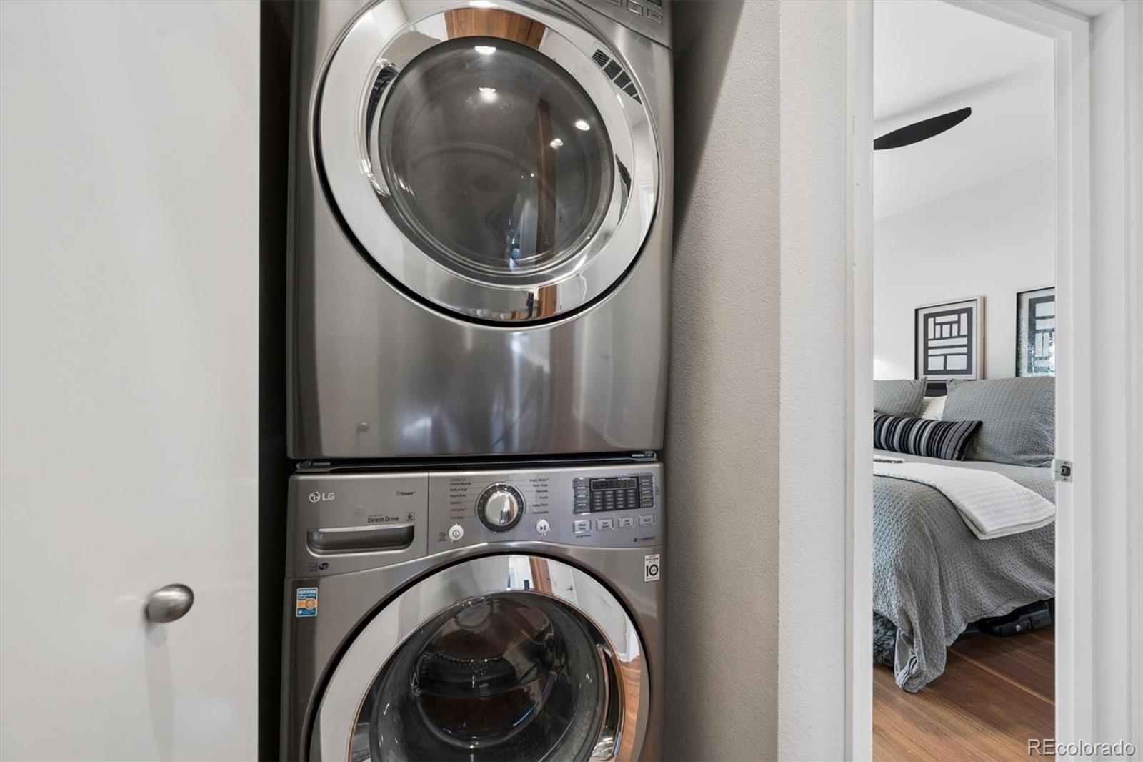 2680 Blake Street, Unit 7 Denver, CO 80205 - Photo 22 of 36 a view of a bedroom with washer and dryer
