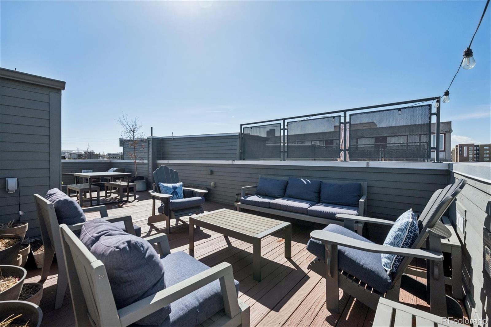 2680 Blake Street, Unit 7 Denver, CO 80205 - Photo 27 of 36 a view of a terrace with chairs