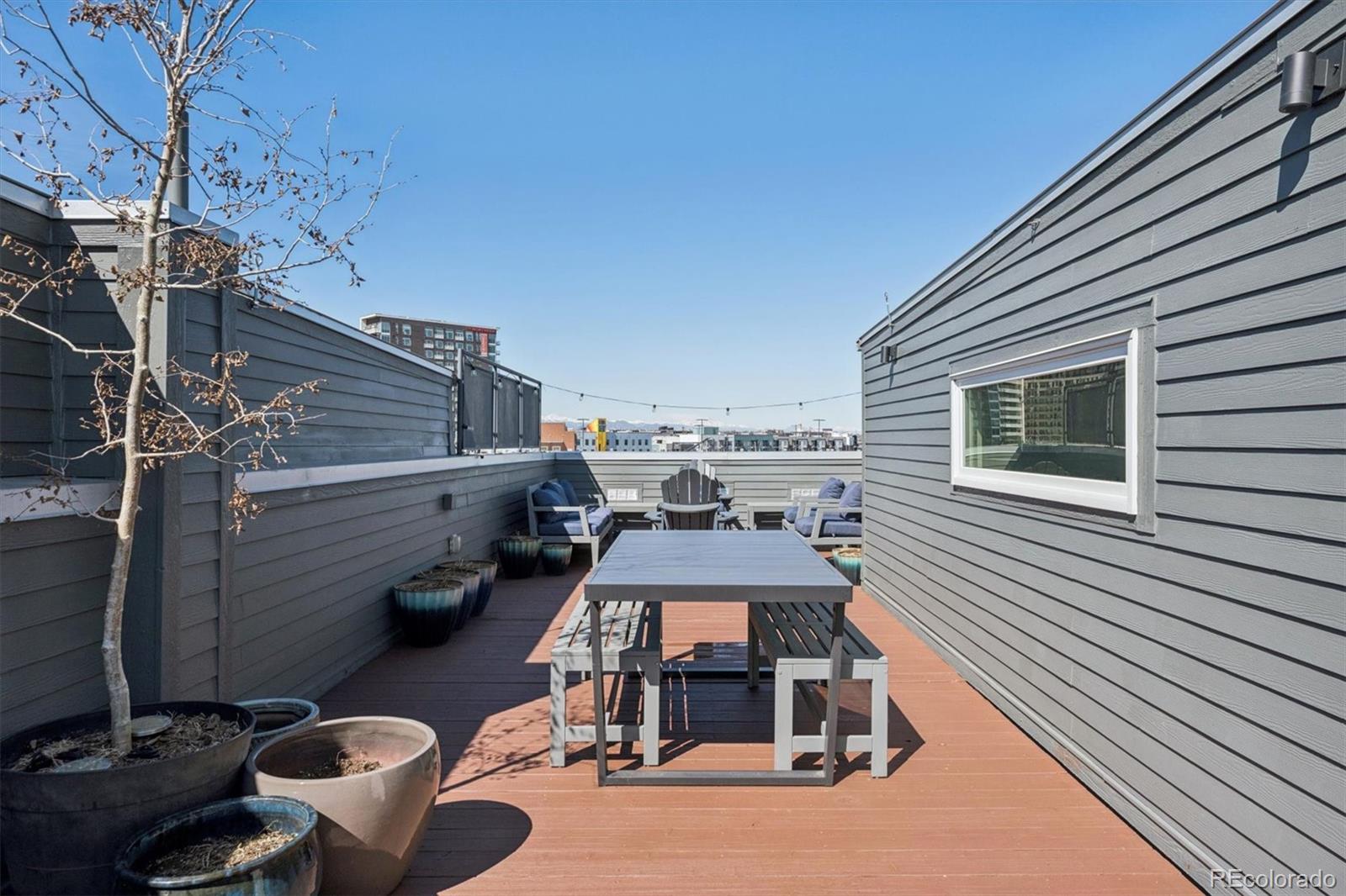 2680 Blake Street, Unit 7 Denver, CO 80205 - Photo 28 of 36 a picture of a outdoor space with seating