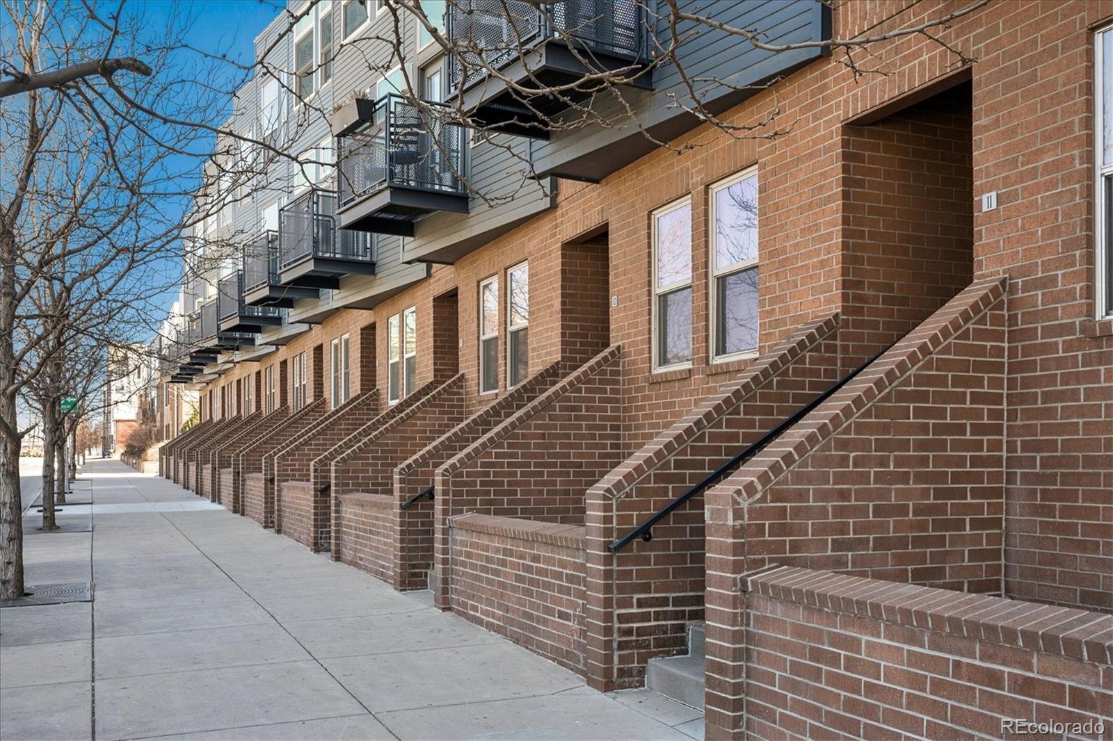 2680 Blake Street, Unit 7 Denver, CO 80205 - Photo 3 of 36 a view of a pathway both side of building