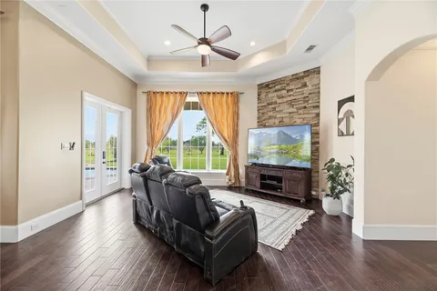 a kitchen with stainless steel appliances kitchen island granite countertop a stove and a sink