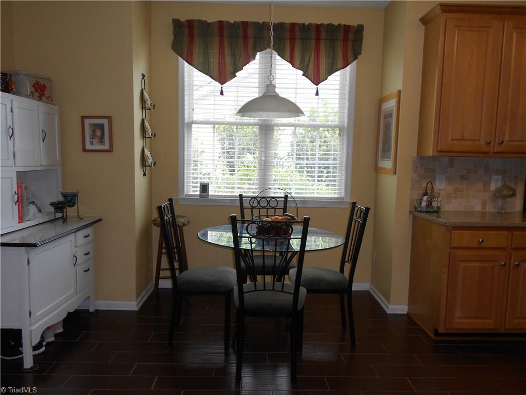 3704 Shadow Ridge Drive High Point, NC 27265 - Photo 8 of 24 Eat in kitchen plus dining area will mean plenty of room for a large gathering or just enough space for a family meal.