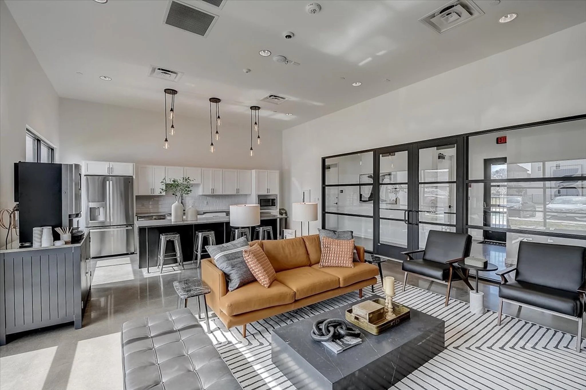 15101 Litsey Crk Drive, Unit 14726R Roanoke, TX 76262 - Photo 18 of 21 a living room with furniture a rug and a flat screen tv