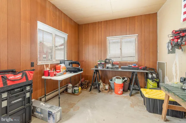 a room with table and chairs