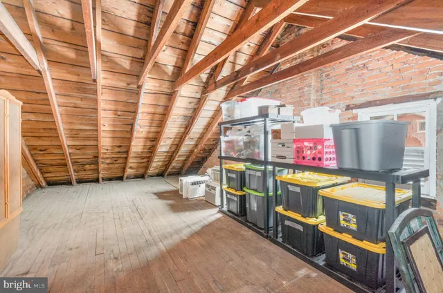 a room with gym equipment and a window