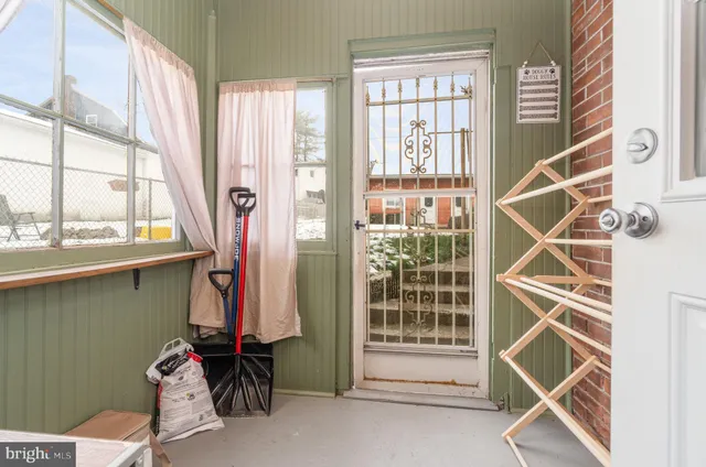 a view of a backyard of the house