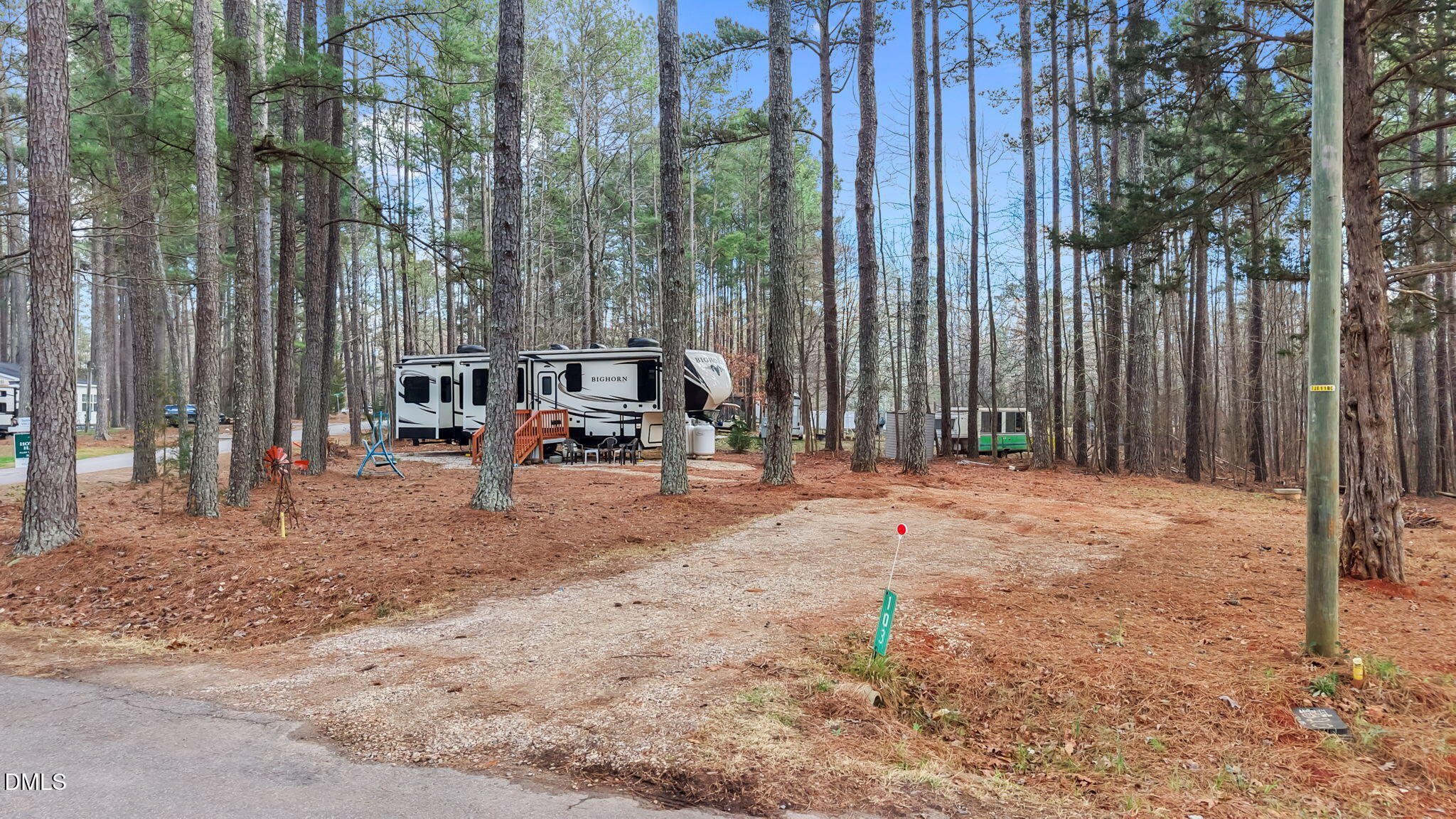 115 Mahto Drive Spring Hope, NC 27882 - Photo 15 of 19 a backyard of a house with table and chairs
