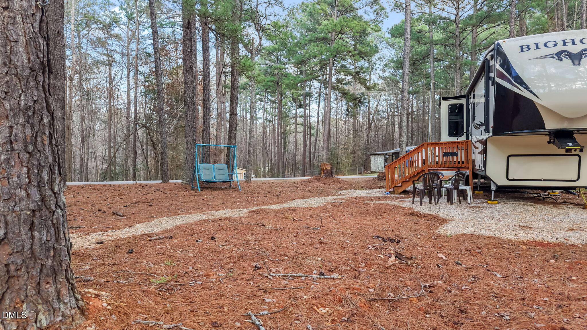115 Mahto Drive Spring Hope, NC 27882 - Photo 16 of 19 a view of backyard with deck and trees