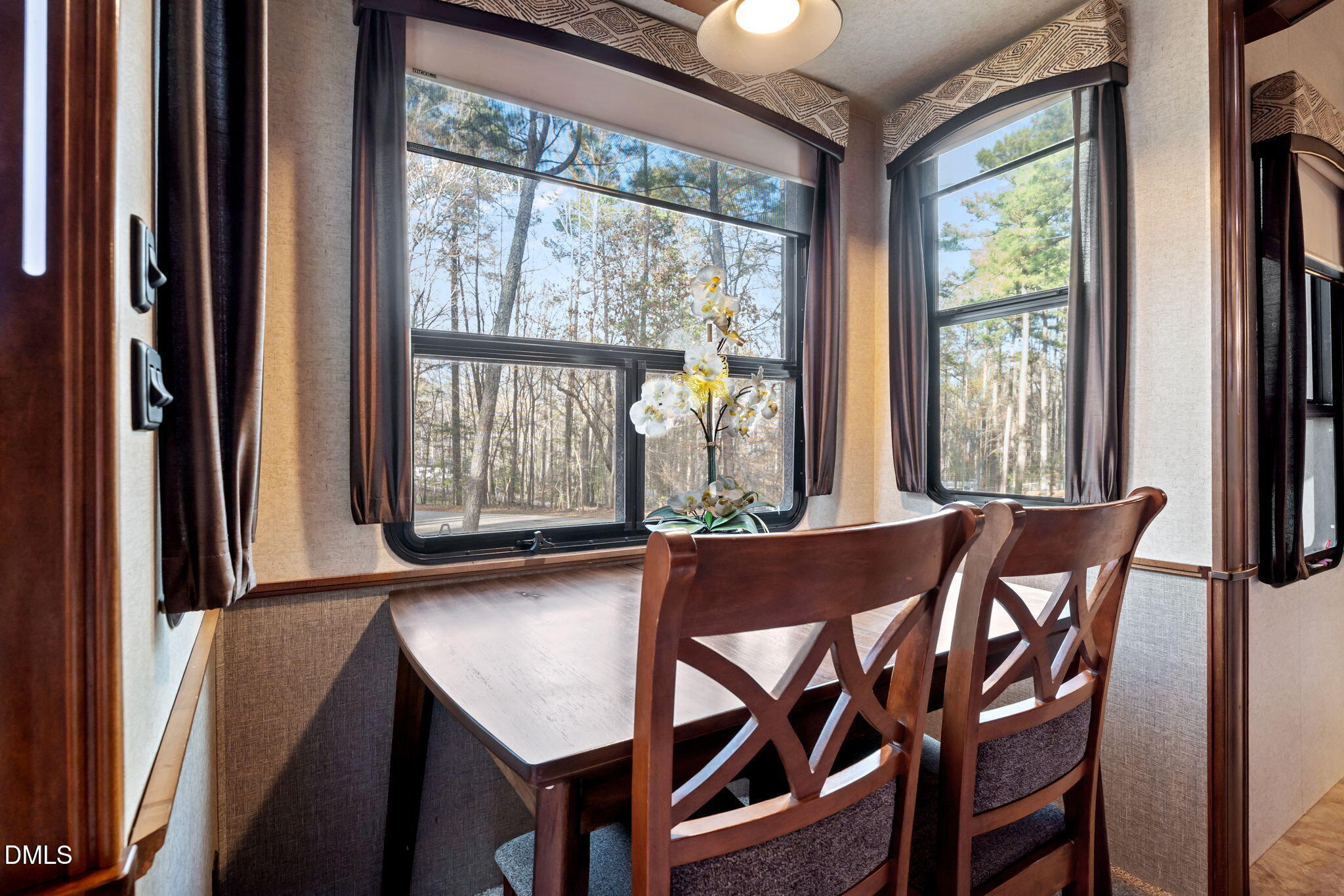 115 Mahto Drive Spring Hope, NC 27882 - Photo 8 of 19 a view of a dining room with furniture and windows