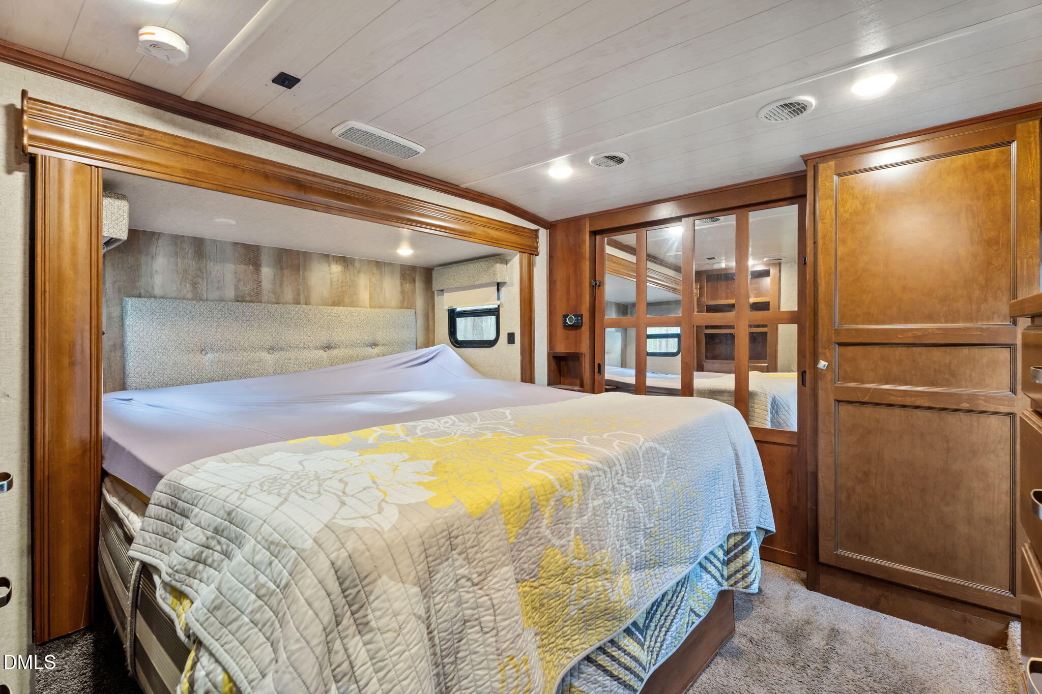 115 Mahto Drive Spring Hope, NC 27882 - Photo 9 of 19 a spacious bedroom with a bed and a large window