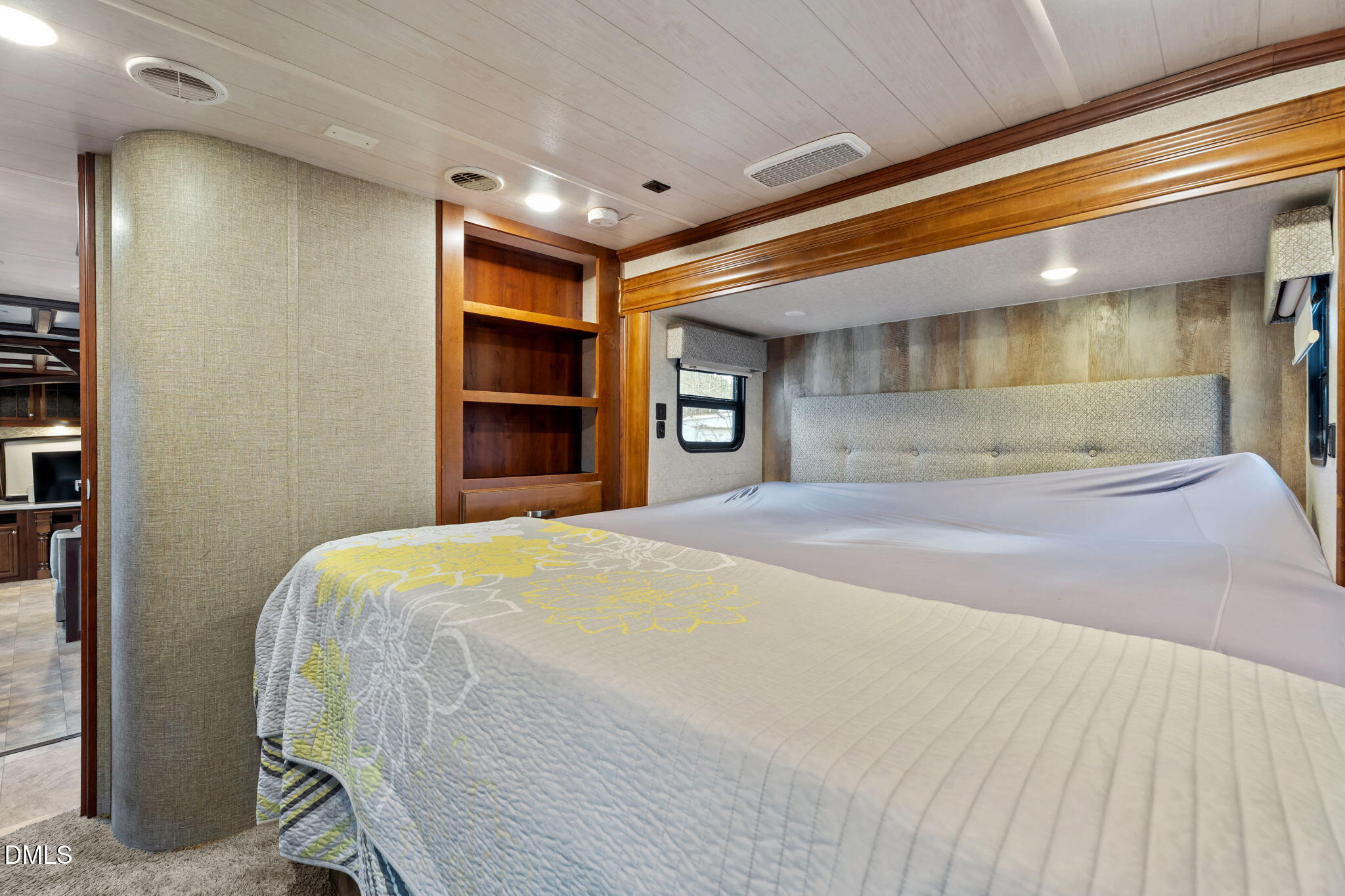 115 Mahto Drive Spring Hope, NC 27882 - Photo 10 of 19 a spacious bedroom with a bed and a lamp