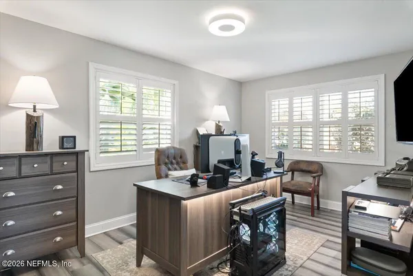 a view of a living room with a flat screen tv