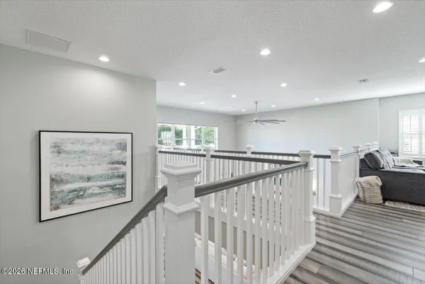a bathroom with a bathtub and a toilet