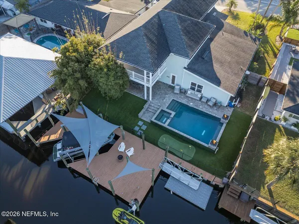 an aerial view of a house with a garden