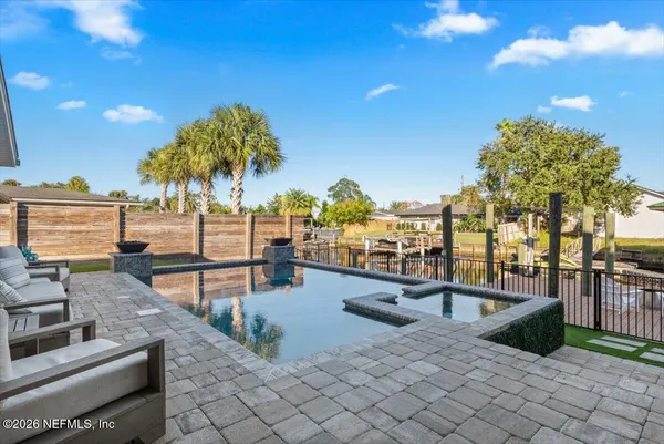 a view of a deck with a backyard